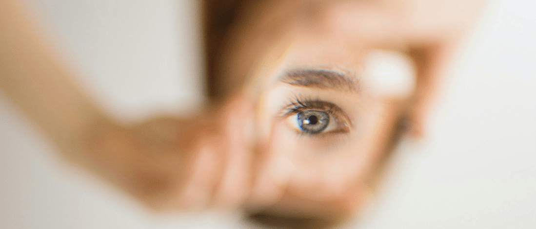 Reflected eye symbolizing introspection, clarity, and creative thinking